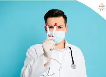 Doctor holding blood sample tubes for AMH fertility test and ovarian reserve assessment